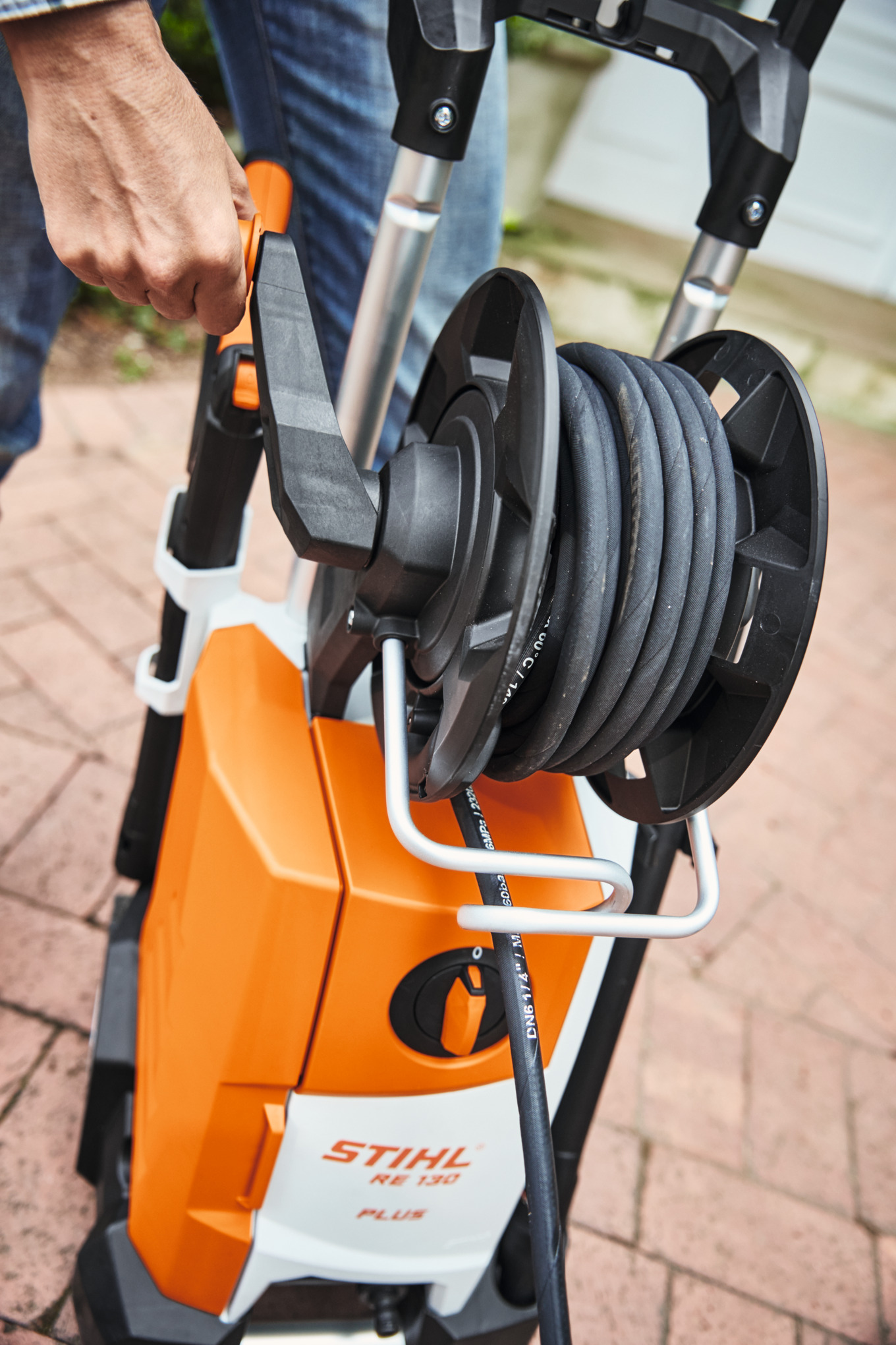 Integrated hose reel